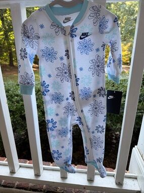 Nike White Footed Baby One-Piece with Blue and Light Blue Snowflakes